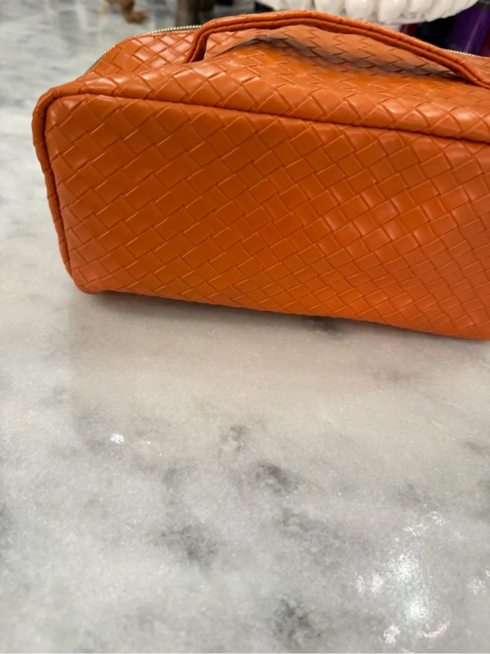 Amazon Orange Woven Cosmetic Bag with Gold Zipper
